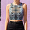 A women's sleeveless racerback crop top with a body-hugging fit. The top features a detailed, kaleidoscopic all-over print inspired by deer pelt. The symmetrical, Rorschach-like design includes abstract spots and textures in shades of brown, blue, black, and grey, creating an intricate pattern that resembles a deer pelt.